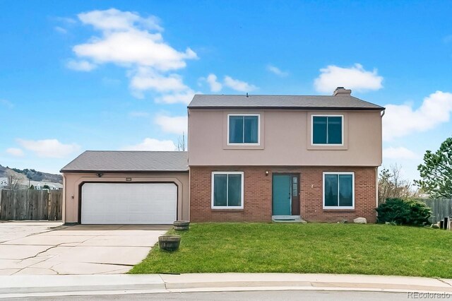 1206 Baldwin Park Cir, Castle Rock, CO 80104 - view of front of house with a garage, driveway, brick siding, a chimney, and stucco siding