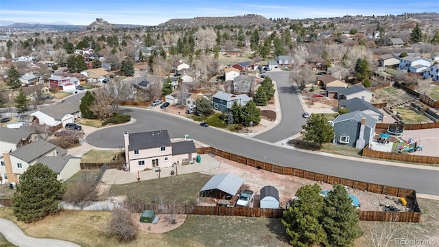 1206 Baldwin Park Cir, Castle Rock, CO 80104 - aerial overview of property's location featuring nearby suburban area and a mountainous background