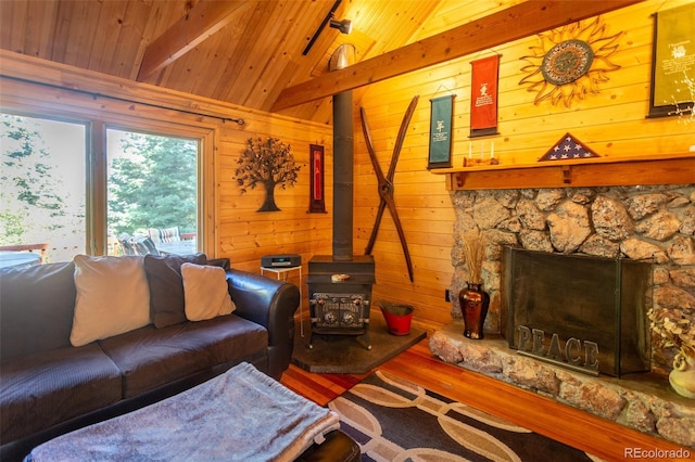 4745 Forest Ln, Howard, CO 81233 - living room featuring wood finished floors, wood ceiling, wood walls, and a wood stove