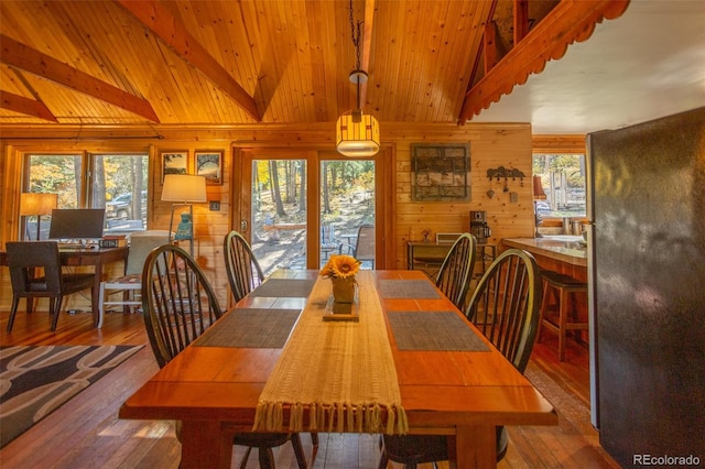 4745 Forest Ln, Howard, CO 81233 - dining room with wooden walls, hardwood / wood-style flooring, healthy amount of natural light, and wooden ceiling