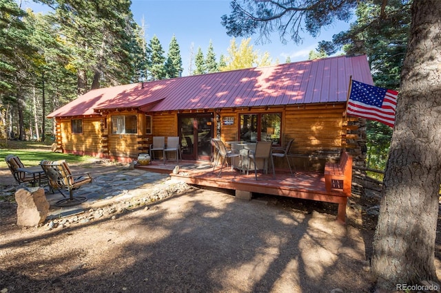 4745 Forest Ln, Howard, CO 81233 - rear view of property with outdoor dining area, metal roof, a deck, log siding, and a patio area