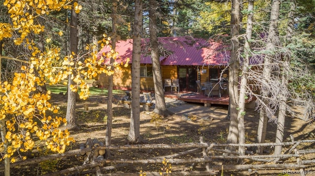 4745 Forest Ln, Howard, CO 81233 - back of property with a deck and metal roof