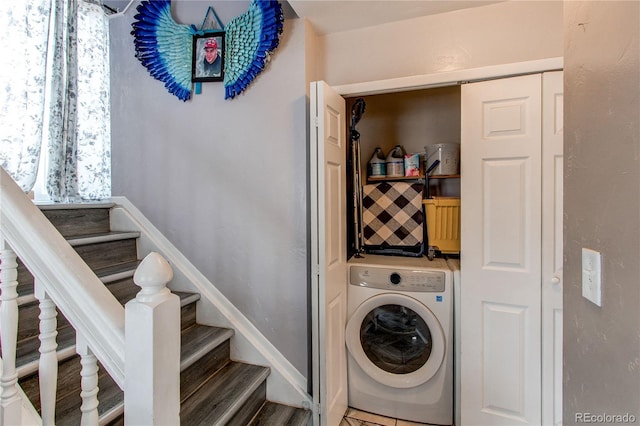 laundry room with washer / dryer