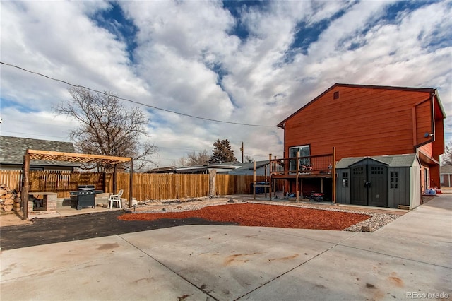 exterior space with a patio area and a storage unit