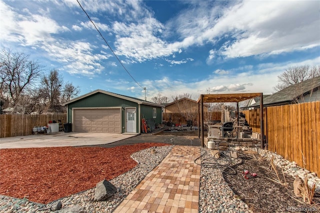 exterior space with a garage and an outdoor structure