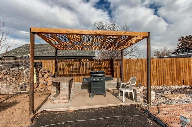 view of patio / terrace with a pergola and area for grilling