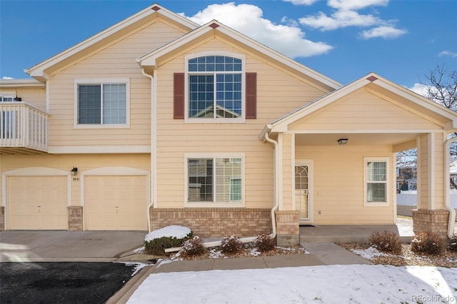 view of front of home with a garage