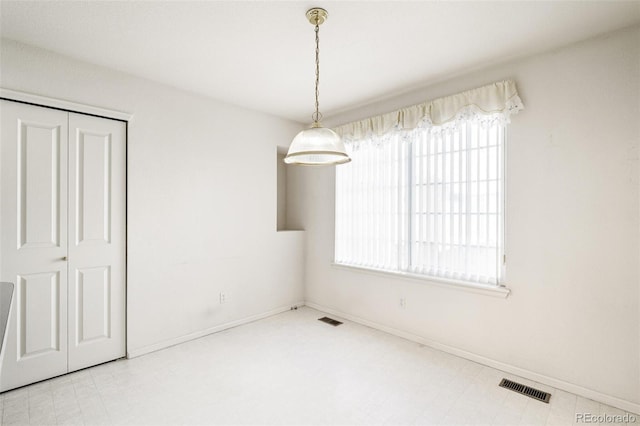 view of unfurnished dining area