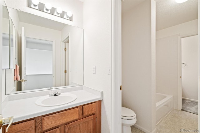 full bathroom with vanity, shower / tub combination, and toilet