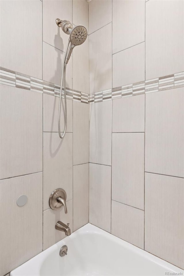 3976 S Washington St, Englewood, CO 80113 - bathroom with bathtub / shower combination