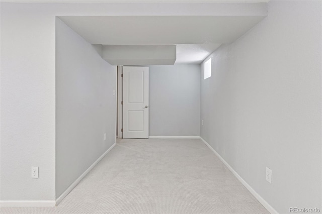 3976 S Washington St, Englewood, CO 80113 - below grade area featuring carpet floors and baseboards