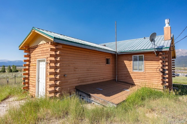 exterior space featuring a mountain view