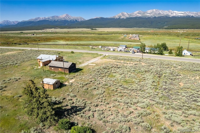 aerial view with a mountain view and a rural view