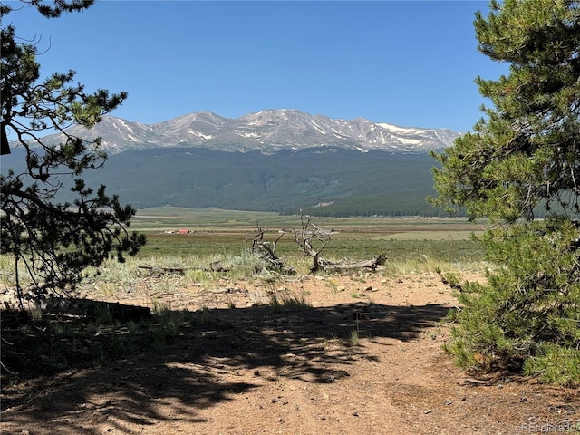 mountain view featuring a rural view