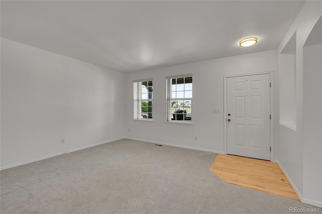 6910 E 131st Dr, Thornton, CO 80602 - entryway featuring light carpet