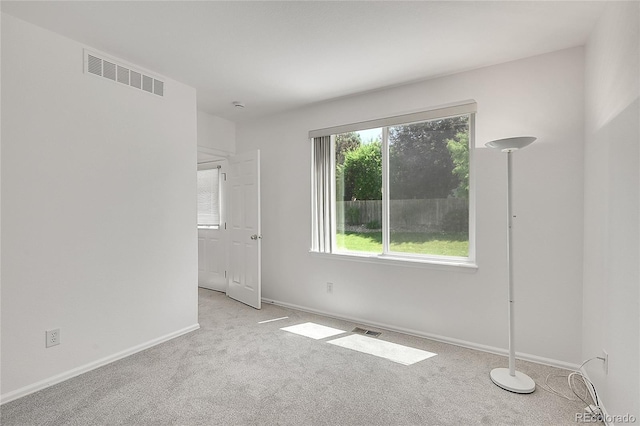 6910 E 131st Dr, Thornton, CO 80602 - empty room featuring light carpet and baseboards