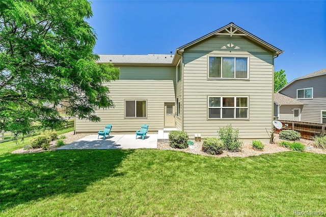 6910 E 131st Dr, Thornton, CO 80602 - rear view of house featuring a patio