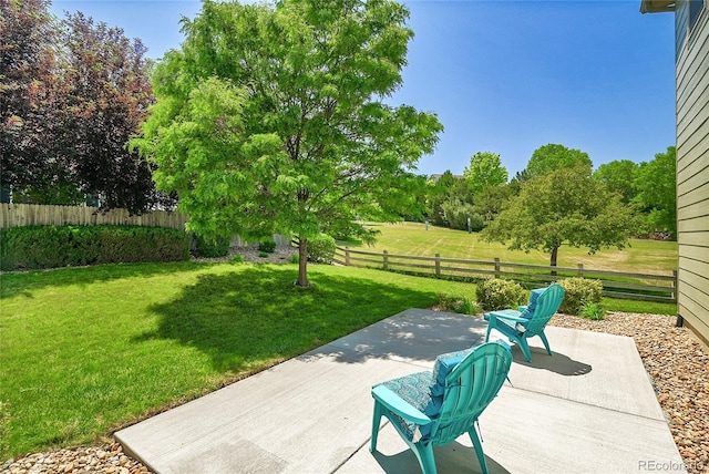 6910 E 131st Dr, Thornton, CO 80602 - fenced backyard with a patio area