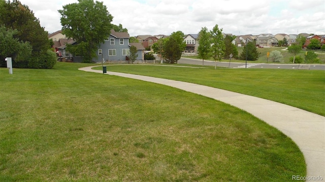 6910 E 131st Dr, Thornton, CO 80602 - view of property's community with a residential view and a yard