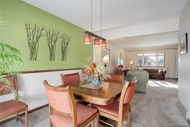 dining area with light carpet