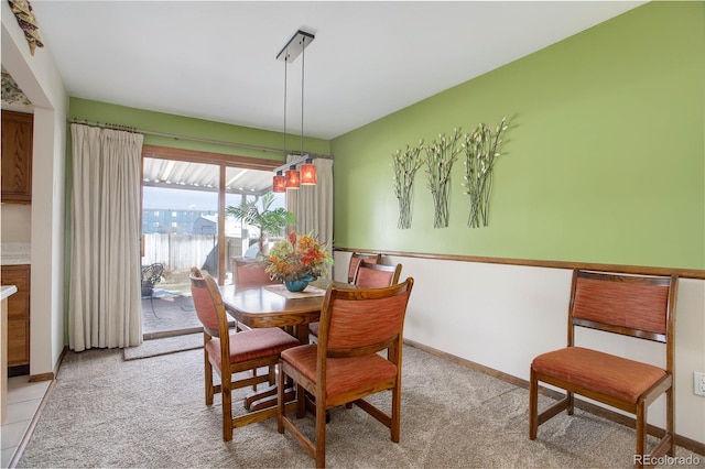 dining area with light carpet