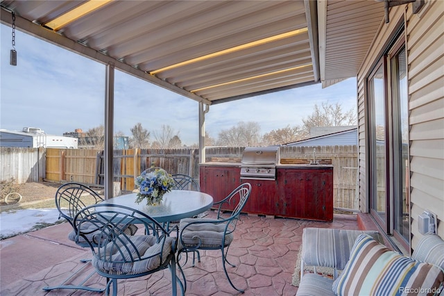 view of patio / terrace with a grill and exterior kitchen