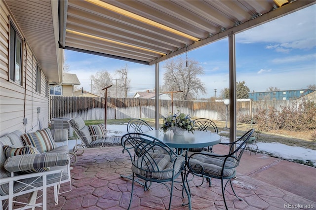 view of patio / terrace featuring central air condition unit and a water view