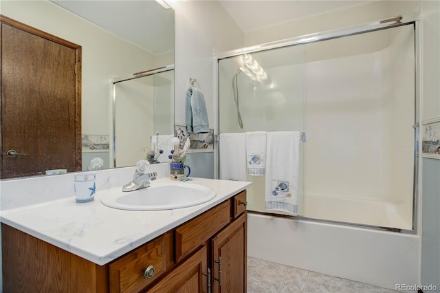 bathroom featuring vanity and enclosed tub / shower combo