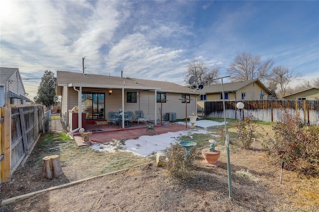 back of house featuring a patio and central AC unit