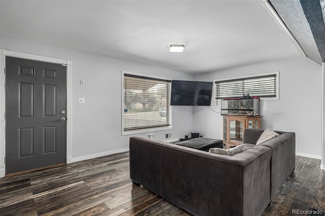 living room with baseboards and dark wood-style floors