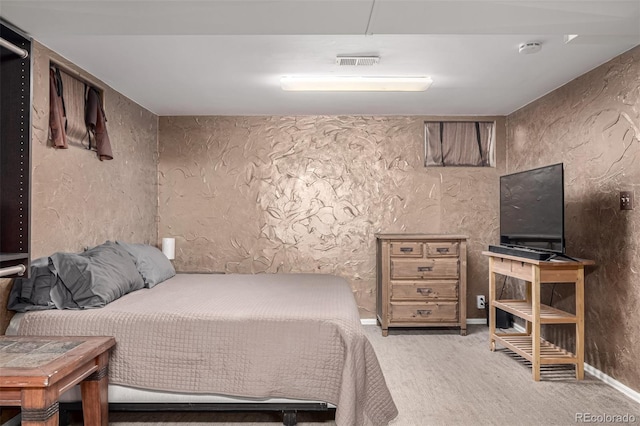 carpeted bedroom with visible vents