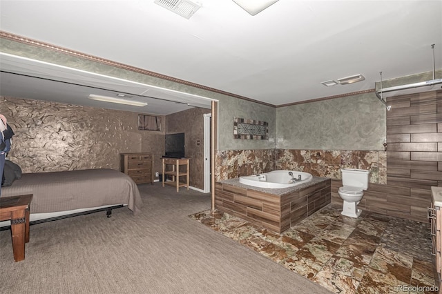 bathroom with a bath, toilet, crown molding, and visible vents