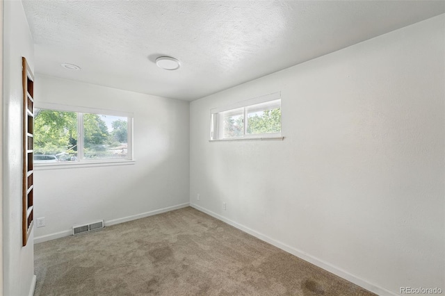 470 S Queen St, Lakewood, CO 80226 - spare room featuring carpet and a textured ceiling