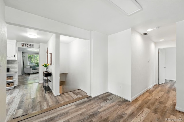 470 S Queen St, Lakewood, CO 80226 - corridor with wood finished floors and recessed lighting