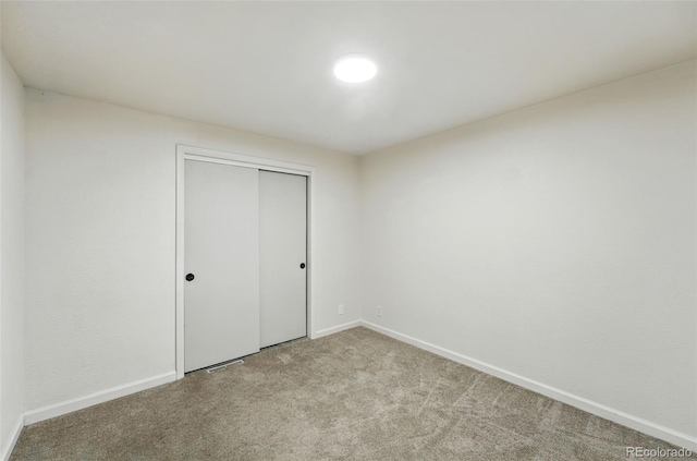 470 S Queen St, Lakewood, CO 80226 - unfurnished bedroom featuring carpet flooring and a closet