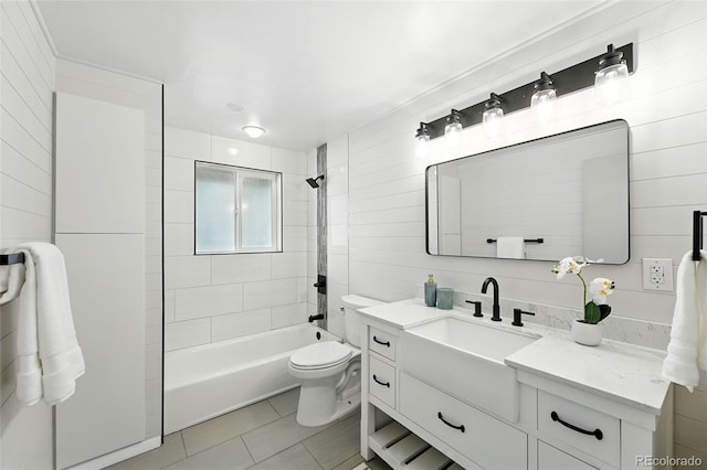 470 S Queen St, Lakewood, CO 80226 - full bath featuring vanity, tile patterned floors, and washtub / shower combination
