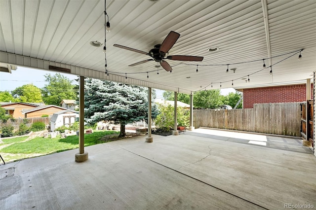 470 S Queen St, Lakewood, CO 80226 - view of patio featuring a ceiling fan and a storage unit