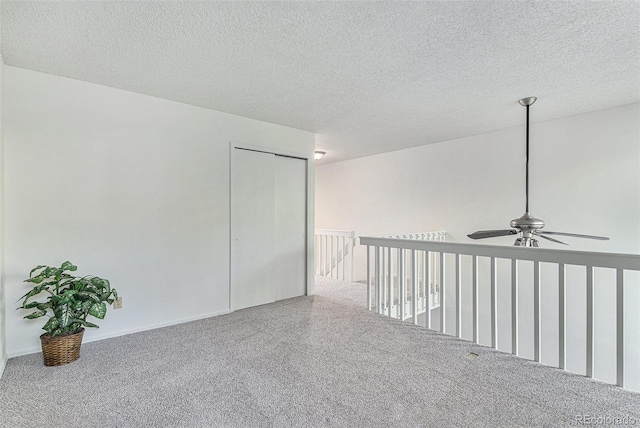 480 W Rockrimmon Blvd Unit D, Colorado Springs, CO 80919 - carpeted empty room featuring ceiling fan and a textured ceiling