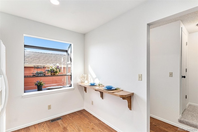 480 W Rockrimmon Blvd Unit D, Colorado Springs, CO 80919 - interior space with wood finished floors and baseboards