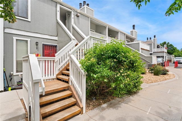 1160 S Monaco Pkwy Unit 6, Denver, CO 80224 - view of property featuring stairs