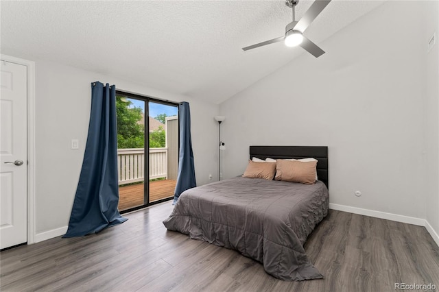 1160 S Monaco Pkwy Unit 6, Denver, CO 80224 - bedroom with access to exterior, wood finished floors, a textured ceiling, vaulted ceiling, and ceiling fan