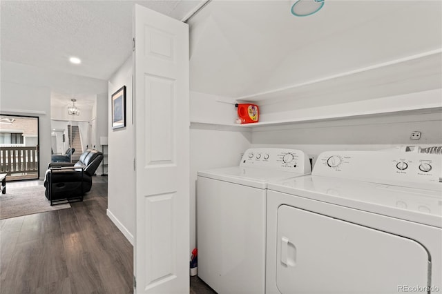 1160 S Monaco Pkwy Unit 6, Denver, CO 80224 - laundry area featuring separate washer and dryer, dark wood finished floors, and a textured ceiling