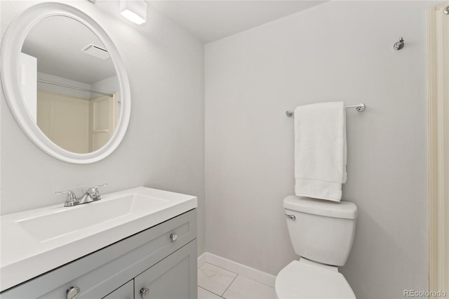 1160 S Monaco Pkwy Unit 6, Denver, CO 80224 - bathroom featuring marble look tile flooring and vanity