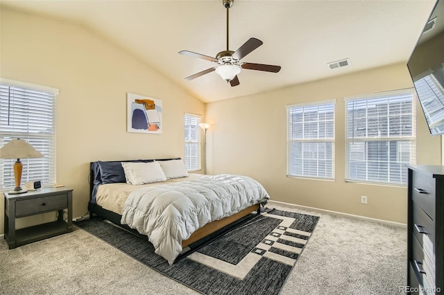 bedroom featuring ceiling fan, light colored carpet, and lofted ceiling