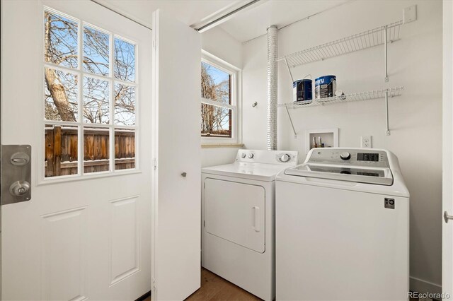 clothes washing area featuring laundry area and independent washer and dryer