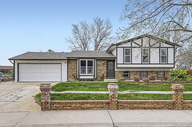 tri-level home featuring a front yard, brick siding, driveway, and a garage