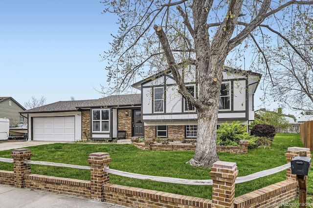 split level home with brick siding, fence, a garage, concrete driveway, and a front yard