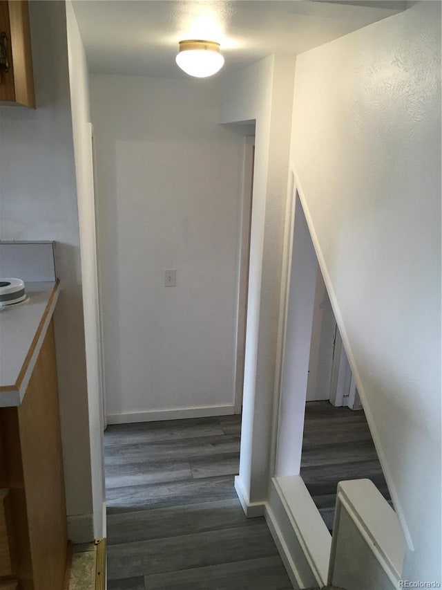 6411 W 82nd Dr, Arvada, CO 80003 - staircase featuring wood finished floors and baseboards