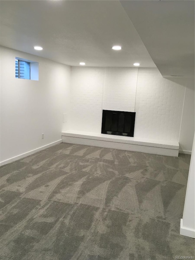 6411 W 82nd Dr, Arvada, CO 80003 - below grade area featuring carpet floors, a fireplace, baseboards, and recessed lighting