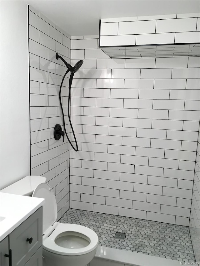 6411 W 82nd Dr, Arvada, CO 80003 - bathroom featuring a shower stall, toilet, and vanity
